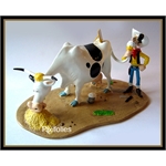 Pixi MORRIS : Lucky Luke Lucky Luke se rasant avec la queue de la vache