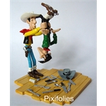 Pixi MORRIS : Lucky Luke Lucky Luke secouant Averell par les pieds Pixi MORRIS : Lucky Luke Lucky Luke secouant Averell par les pieds