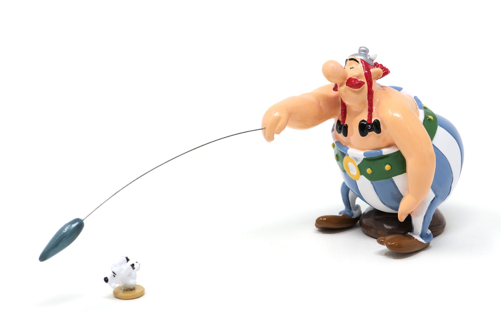 Pixi UDERZO : Astérix Classique Obelix throwing the mini menhir at Idefix